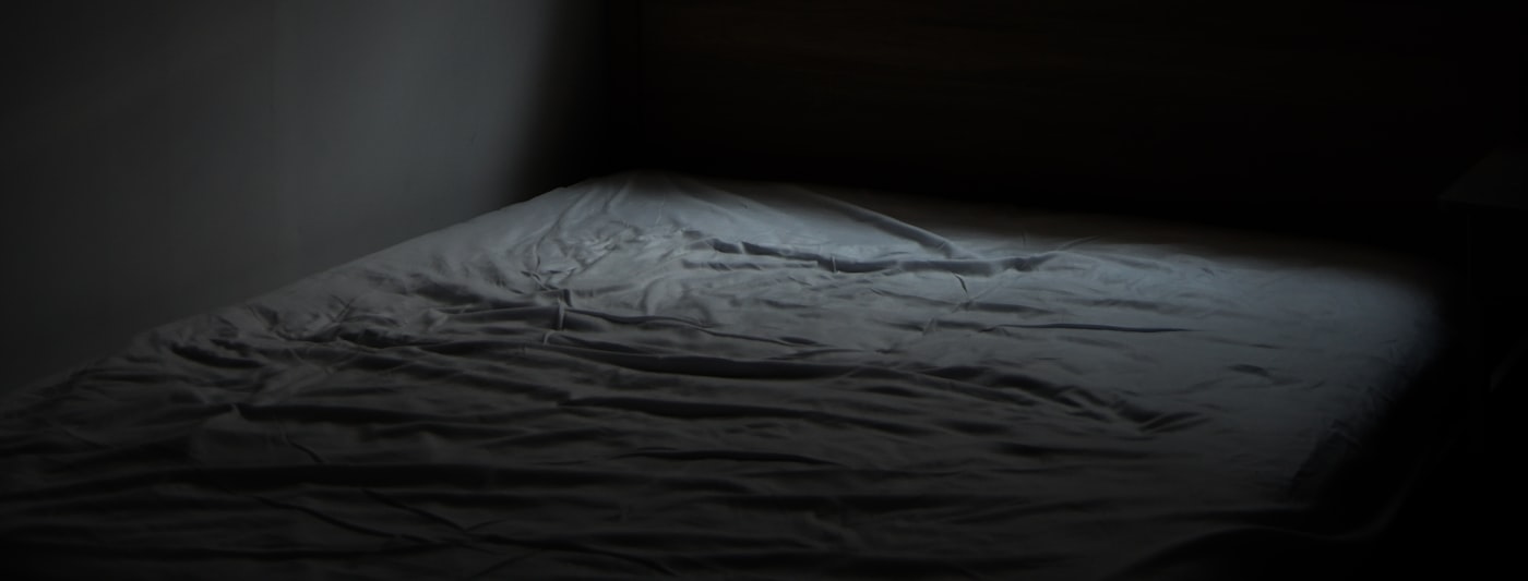 A dark bedroom at night